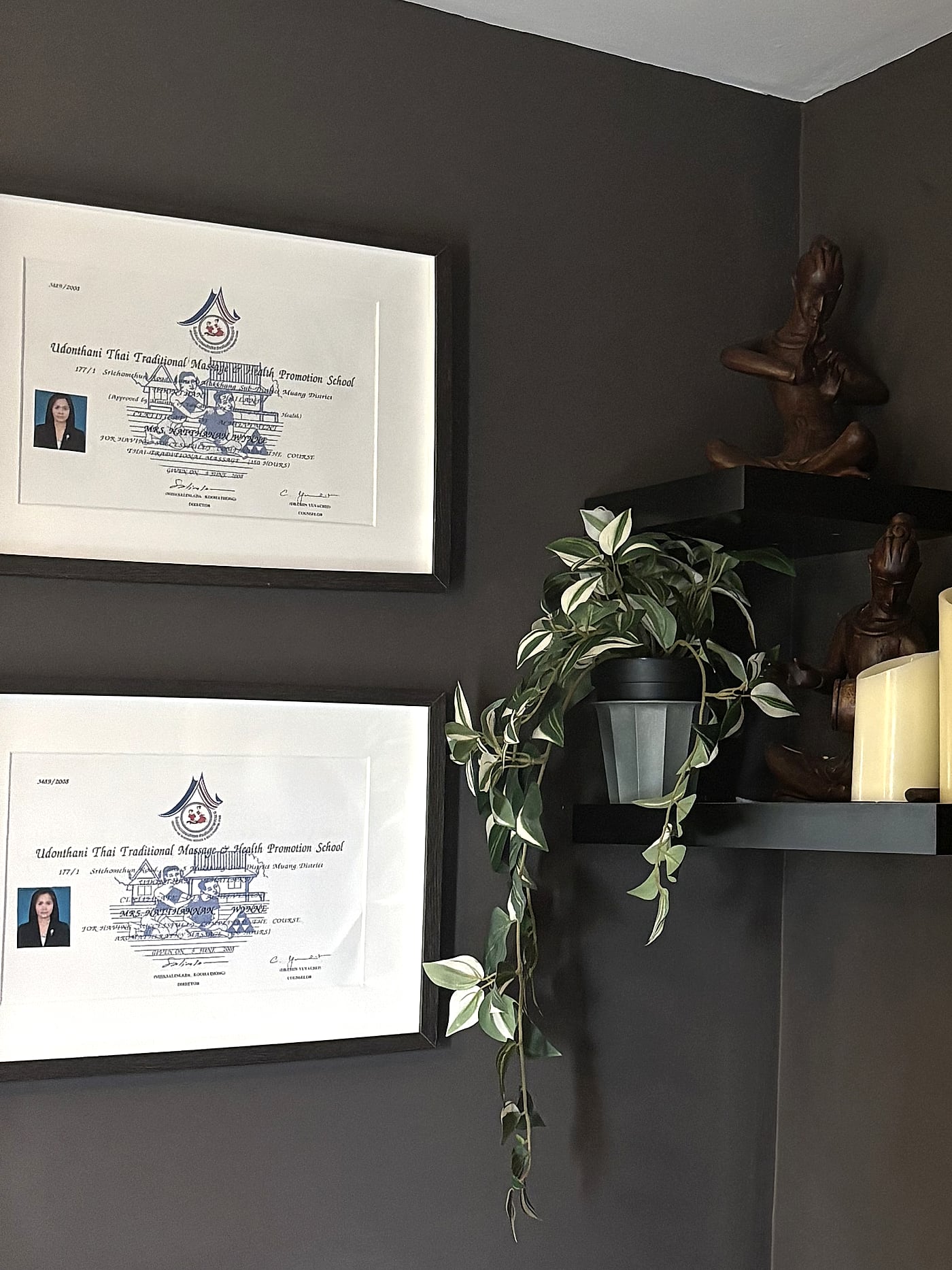 Two framed certificates from the Udonthani Thai Traditional Massage & Health Promotion School in Thailand, awarded to Natthanan Wynne